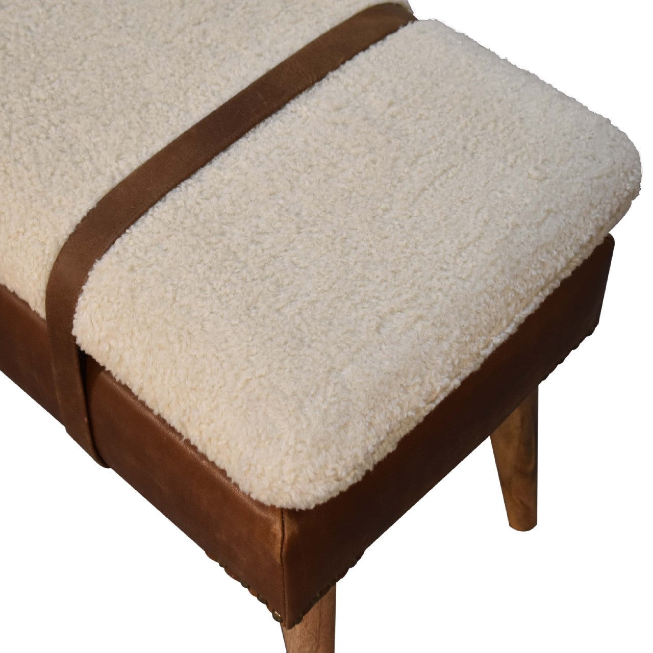 Modern boucle bench with white cushion and buffalo hide leather base – rustic accent seating for living room or entryway.