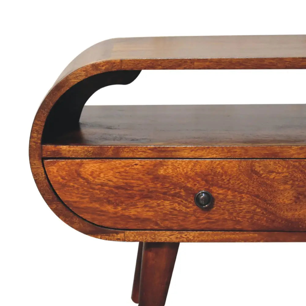 Chestnut Circular TV Stand made from solid mango wood with 2 drawers, open slot, and Nordic-style legs. Corner view