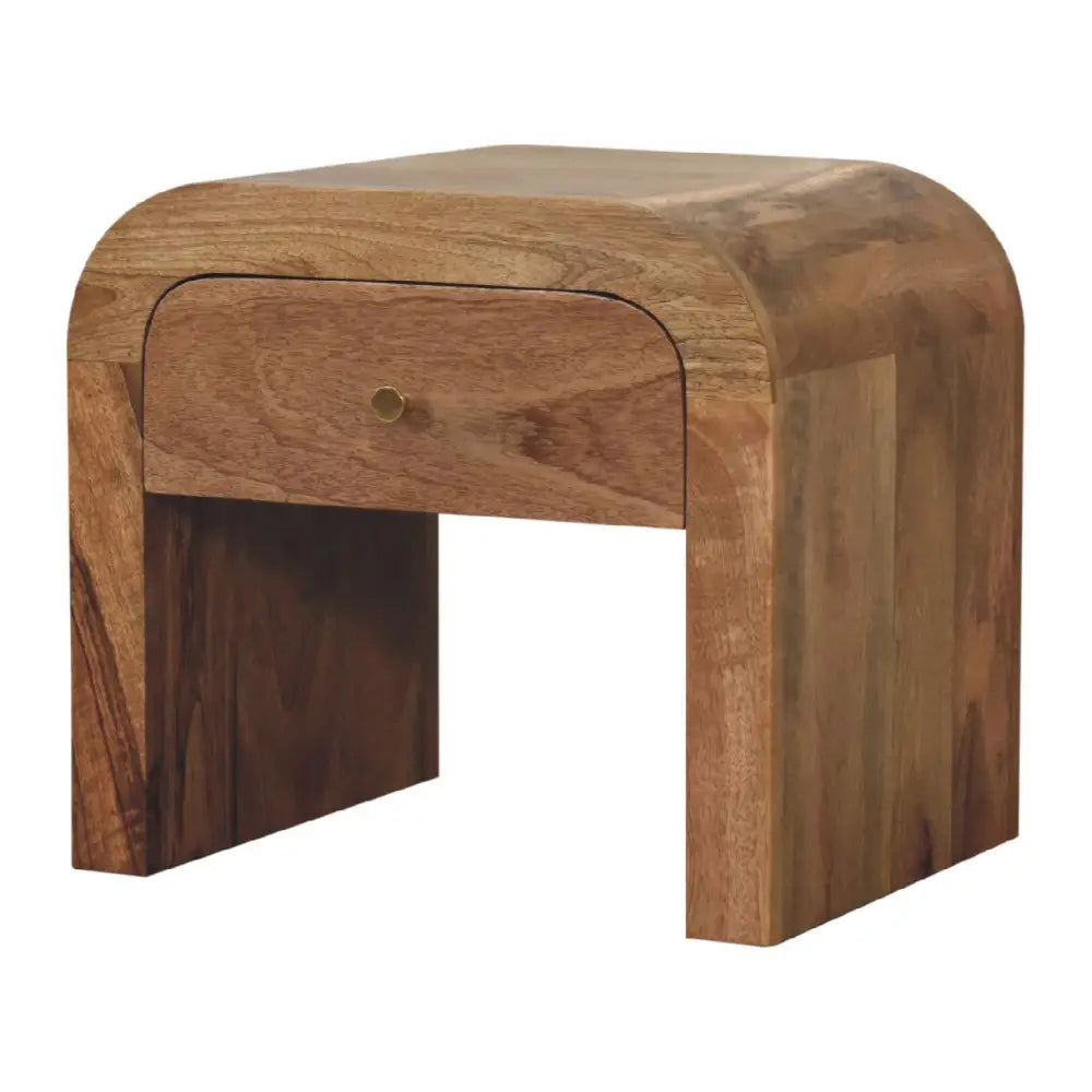 Darcy nightstand with one drawer, open shelf, brass knob, and solid mango wood frame in chestnut finish. Corner view