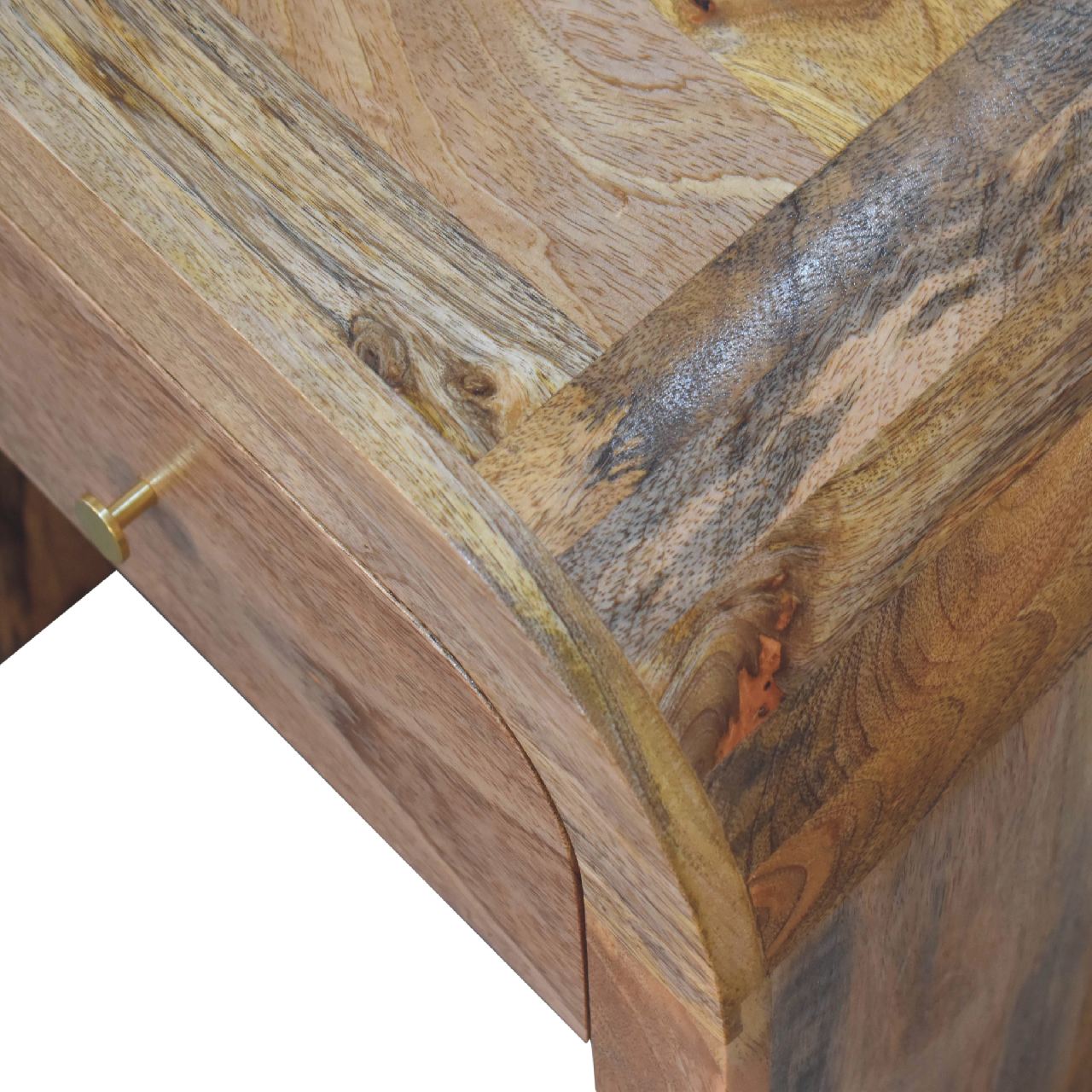 Darcy nightstand with one drawer, open shelf, brass knob, and solid mango wood frame in chestnut finish. Closer view of the wood and edge