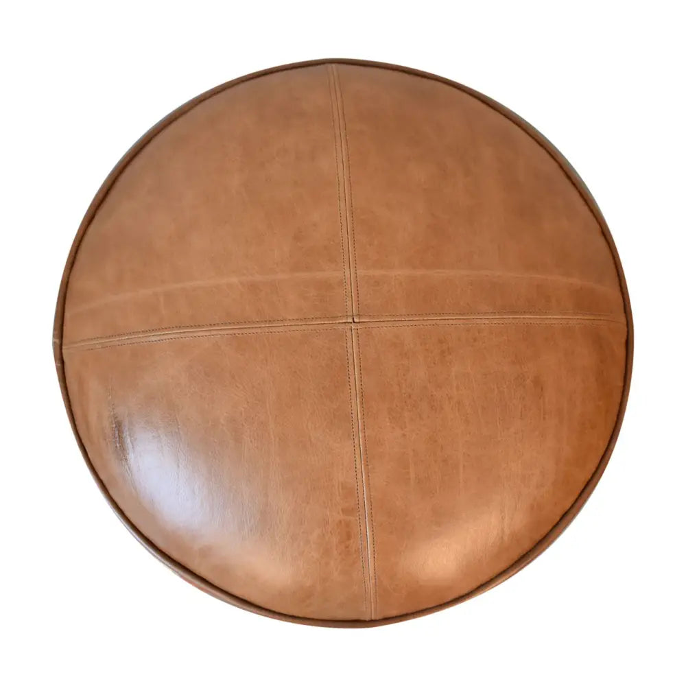 Durrie & Leather Mixed Footstool with Nordic-style legs, buffalo leather, and durrie print. Bird eye view of the top of footstool