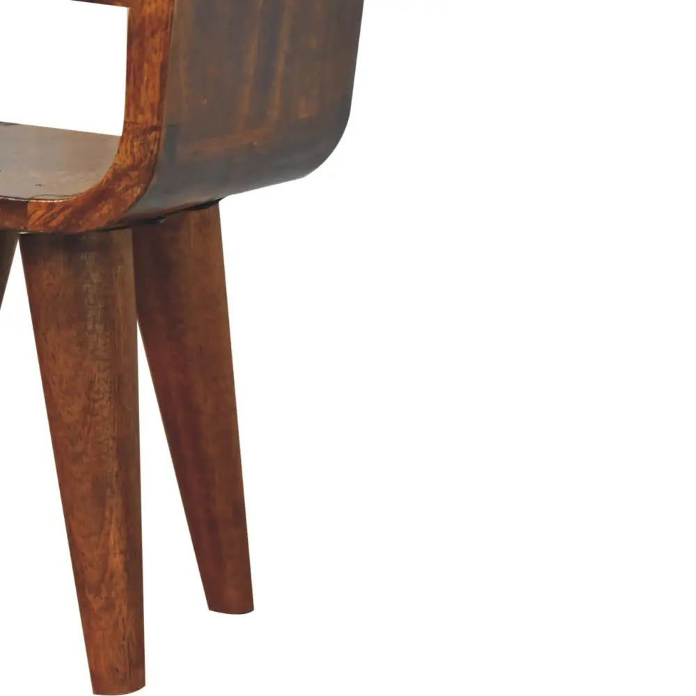 Extra Mini Chestnut Curve Lower Bedside made from solid mango wood with drawer, open storage slot, and curved edges. Legs view