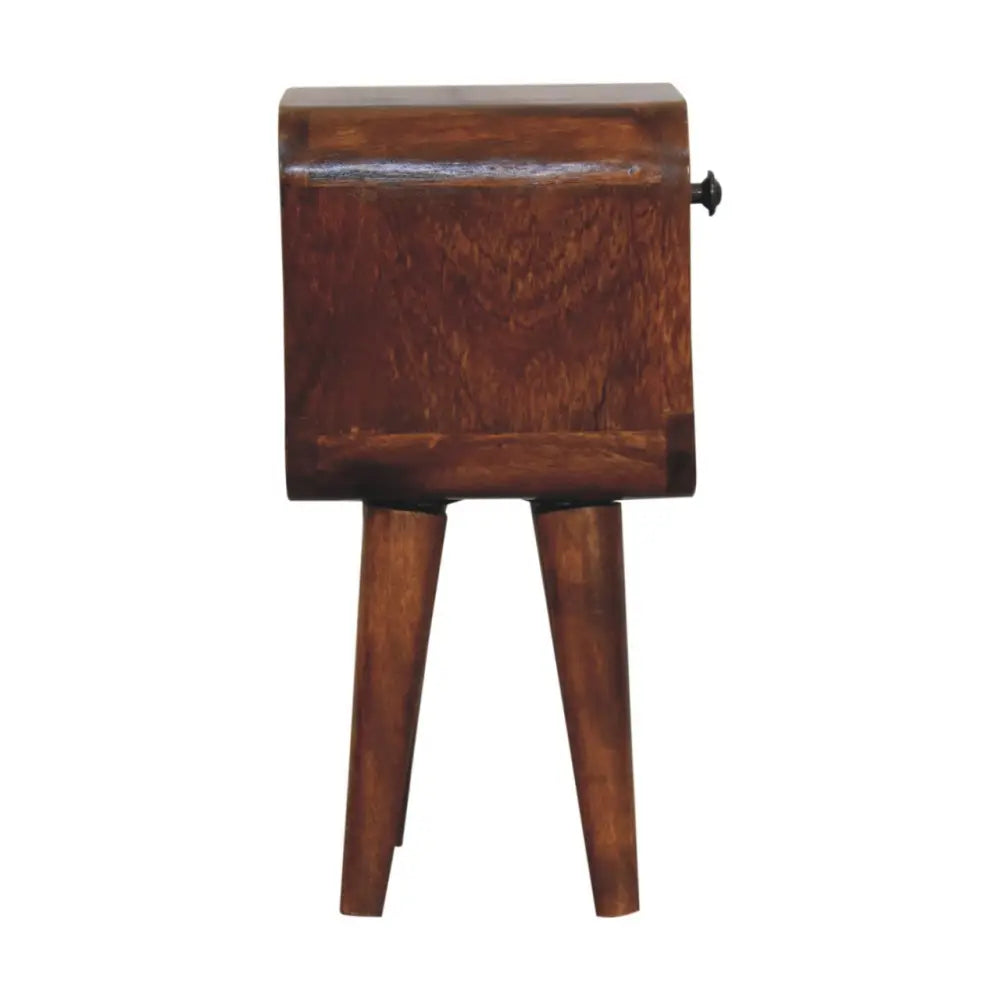 Extra Mini Chestnut Curve Lower Bedside made from solid mango wood with drawer, open storage slot, and curved edges. Corner view