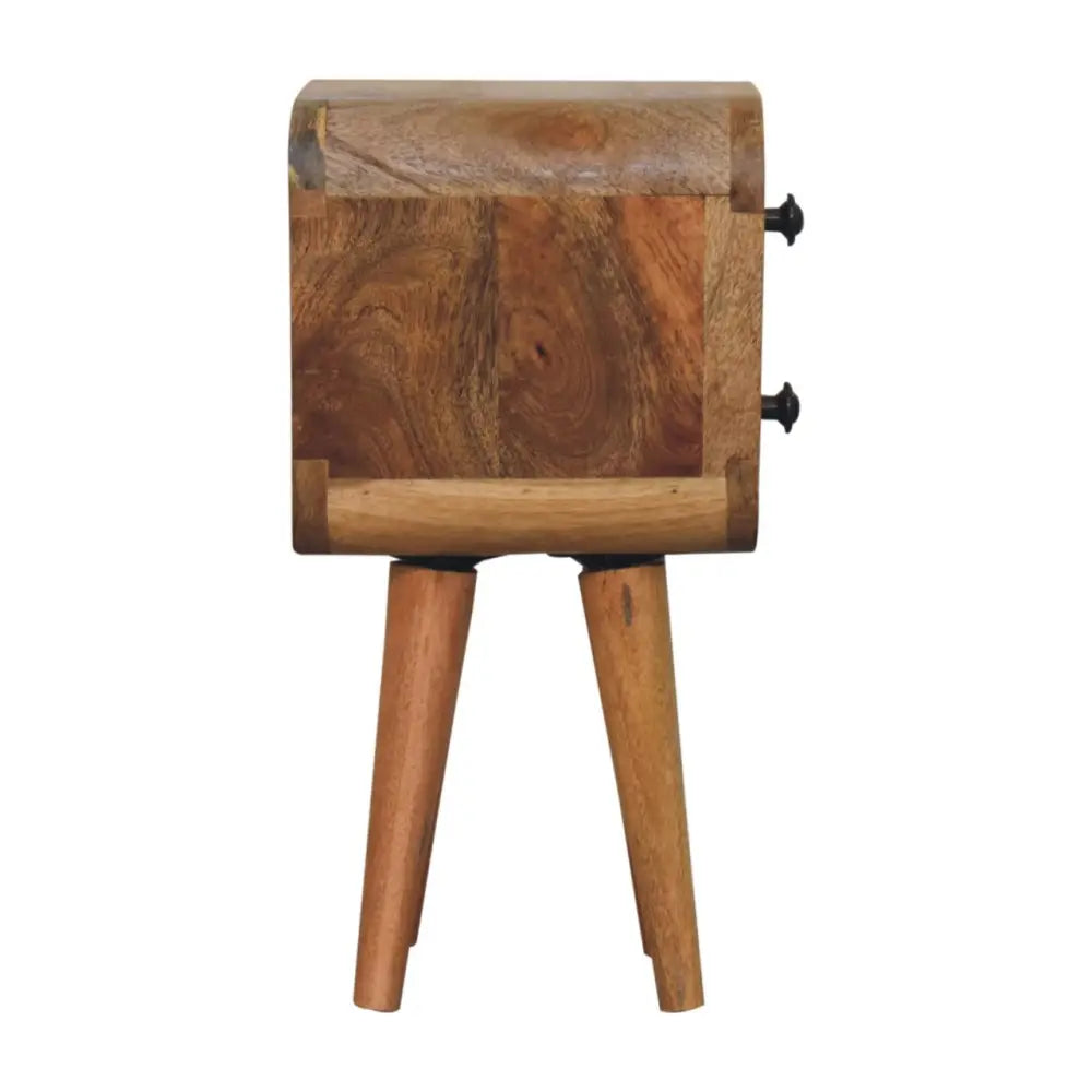 Extra Mini Curved Oak-ish Bedside Table made from solid mango wood with two drawers and Nordic-style legs. Side view
