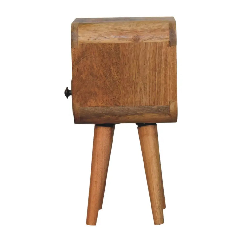 Extra Mini Oak-ish Bedside Table made from solid mango wood with one drawer, open slot, and Nordic-style legs. Side view