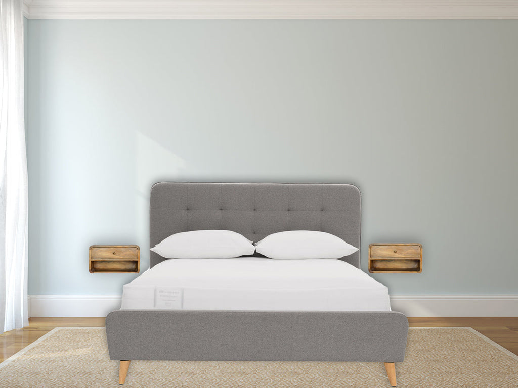 Floating Curve Open Slot Nightstand with one drawer and open shelf, made from solid mango wood. Two wall mounted nightstand by bedside.
