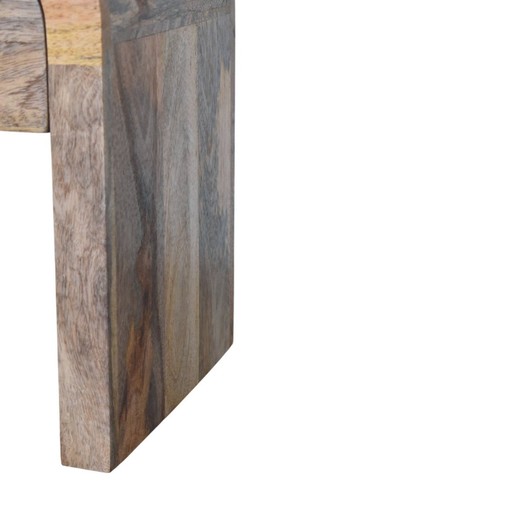Mini Darcy Oak-ish Nightstand with a single drawer, brass knob, and curved edges. Foot view