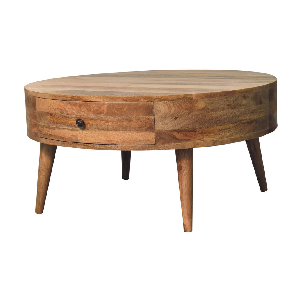 Odyssey Oak-ish Coffee Table made from solid mango wood with circular design and drawer with brass knob. Close up view of table