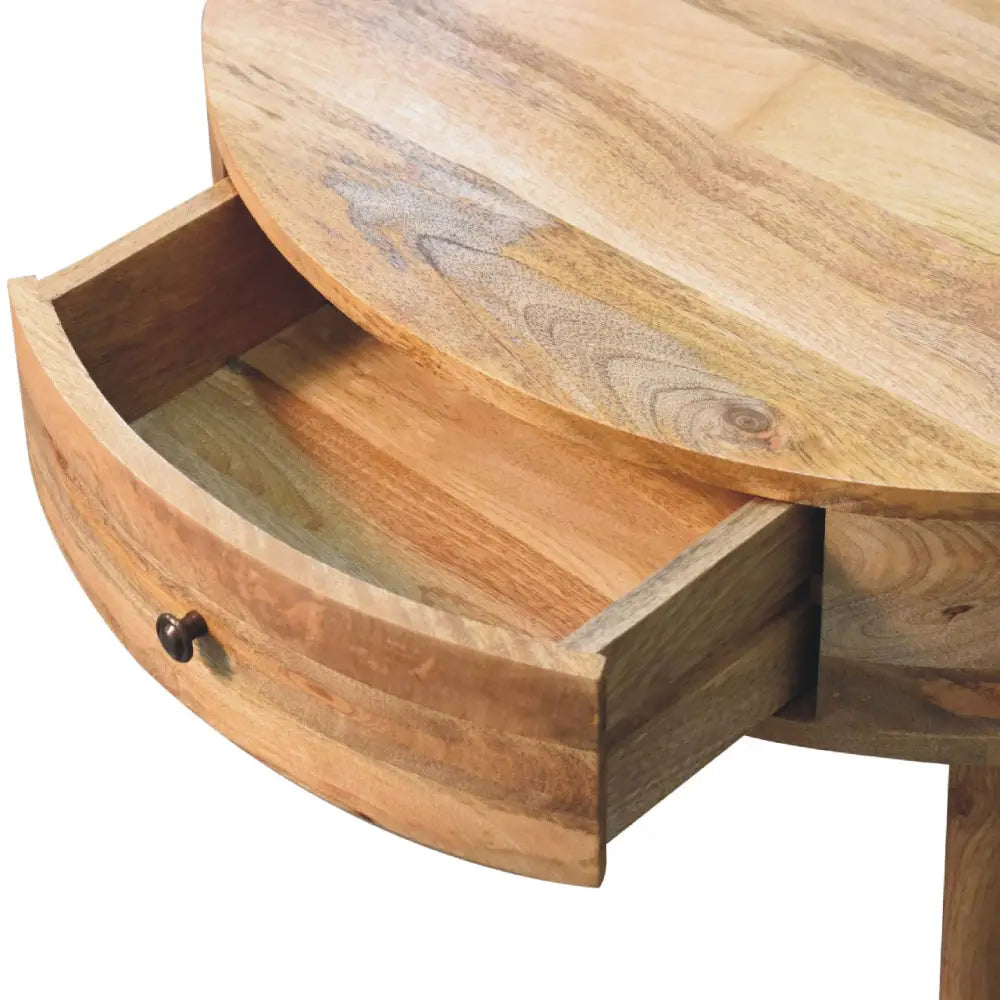 Odyssey Oak-ish Coffee Table made from solid mango wood with circular design and drawer with brass knob. Opened drawer view