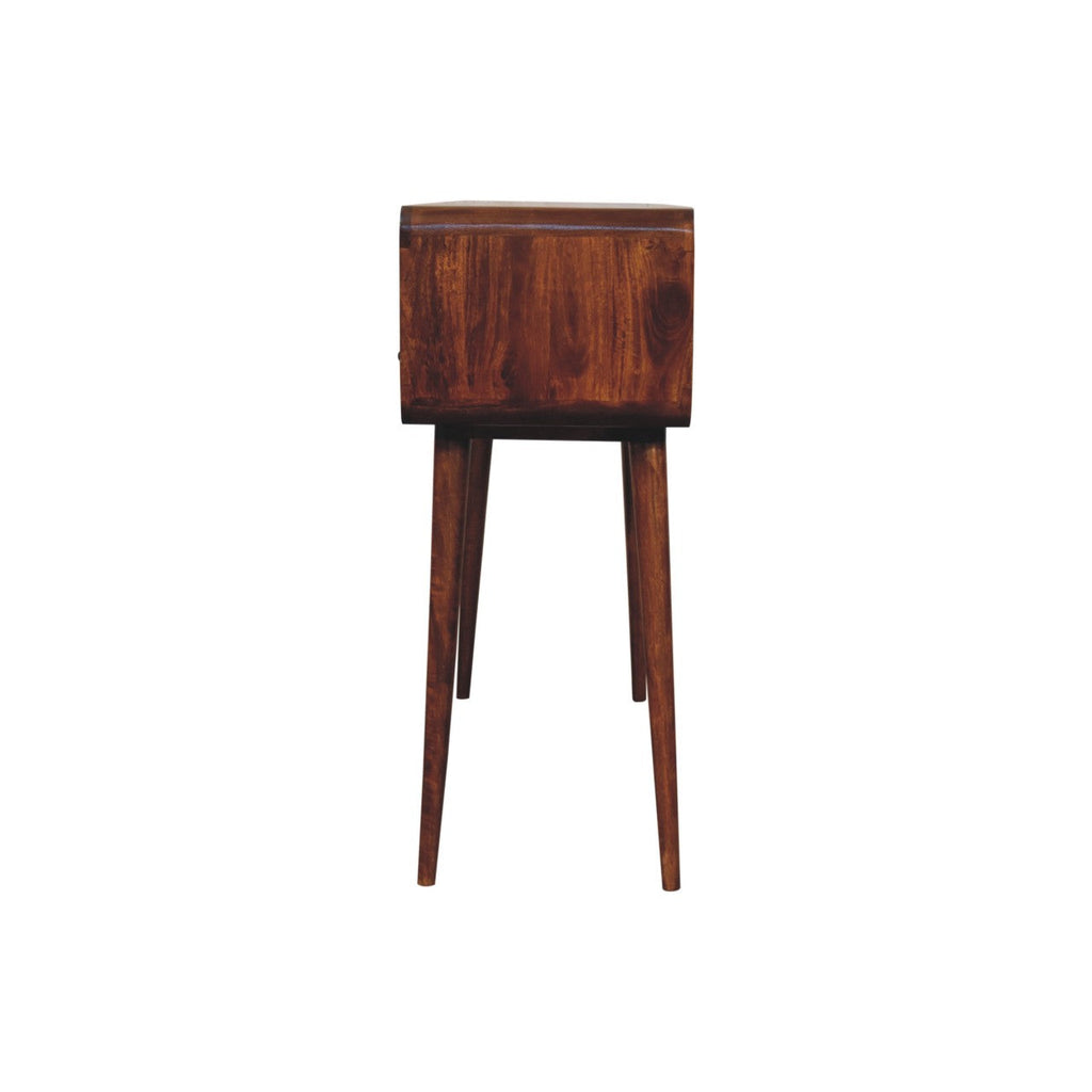 Extra Mini Curved Chestnut Bedside Table made from solid mango wood with one drawer and open lower shelf. Side view